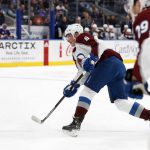 
              Colorado Avalanche defenseman Cale Makar (8) shoots the puck for a goal in the first period of an NHL hockey game against the New York Islanders on Monday, March 7, 2022, in Elmont, N.Y. (AP Photo/Jim McIsaac)
            