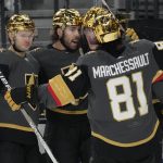 
              Vegas Golden Knights center Chandler Stephenson, second from left, celebrates after scoring against the Los Angeles Kings during the second period of an NHL hockey game Saturday, March 19, 2022, in Las Vegas. (AP Photo/John Locher)
            