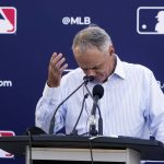 
              Major League Baseball Commissioner Rob Manfred gestures as he answers questions during a news conference after negotiations with the players' association toward a labor deal, Tuesday, March 1, 2022, at Roger Dean Stadium in Jupiter, Fla. Manfred said he is canceling the first two series of the season that was set to begin March 31, dropping the schedule from 162 games to likely 156 games at most. Manfred said the league and union have not made plans for future negotiations. Players won't be paid for missed games. (AP Photo/Wilfredo Lee)
            