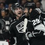 
              Los Angeles Kings defenseman Sean Durzi (50) celebrates with right wing Martin Frk (29) after Frk scored during the third period of an NHL hockey game against the Florida Panthers Sunday, March 13, 2022, in Los Angeles. (AP Photo/Ashley Landis)
            