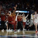 
              Iowa State players react in front of Wisconsin's Tyler Wahl after a second-round NCAA college basketball tournament game Sunday, March 20, 2022, in Milwaukee. Iowa State won 54-49. (AP Photo/Morry Gash)
            