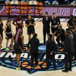 
              South Carolina players rally at center court during a practice session for a college basketball game in the semifinal round of the Women's Final Four NCAA tournament Thursday, March 31, 2022, in Minneapolis. (AP Photo/Eric Gay)
            