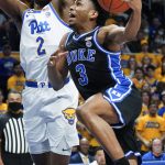 
              Duke's Jeremy Roach (3) goes up for a shot as Pittsburgh's Femi Odukale (2) defends during the first half of an NCAA college basketball game Tuesday, March 1, 2022, in Pittsburgh. (AP Photo/Keith Srakocic)
            