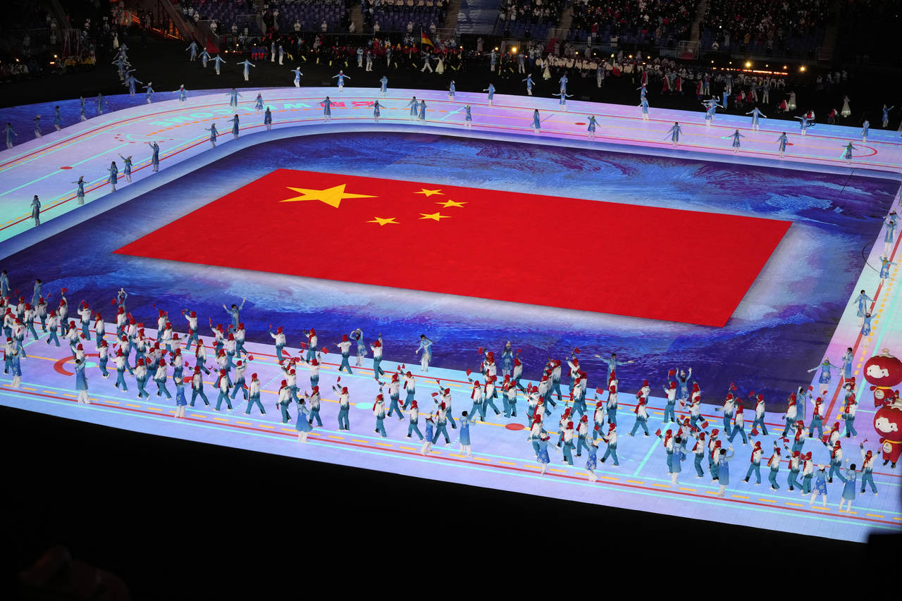 Team China make their entrance during the opening ceremony at the 2022 Winter Paralympics, Friday, ...