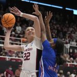 
              Stanford forward Cameron Brink (22) drives to the basket against Kansas center Taiyanna Jackson (1) during the first half of a second-round game in the NCAA women's college basketball tournament Sunday, March 20, 2022, in Stanford, Calif. (AP Photo/Tony Avelar)
            