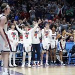 
              Players on the Gonzaga bench cheer for Gonzaga forward Drew Timme, left, during the second half of a first round NCAA college basketball tournament game against Georgia State, Thursday, March 17, 2022, in Portland, Ore. (AP Photo/Craig Mitchelldyer)
            