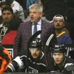 
              Los Angeles Kings head coach Todd McLellan talks to his team during the first period of an NHL hockey game against the Seattle Kraken Monday, March 28, 2022, in Los Angeles. (AP Photo/Mark J. Terrill)
            