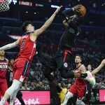 
              LA Clippers guard Reggie Jackson (1) shoots against Washington Wizards forward Deni Avdija (9) during the first half of an NBA basketball game in Los Angeles, Wednesday, March 9, 2022. (AP Photo/Ashley Landis)
            