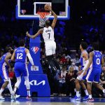
              Brooklyn Nets' Kevin Durant (7) goes up for a dunk during the first half of an NBA basketball game against the Philadelphia 76ers, Thursday, March 10, 2022, in Philadelphia. (AP Photo/Matt Slocum)
            