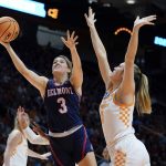 
              Belmont's Madison Bartley (3) drives against Tennessee's Karoline Striplin (11) in the first half of a women's college basketball game in the second round of the NCAA tournament Monday, March 21, 2022, in Knoxville, Tenn. (AP Photo/Mark Humphrey)
            