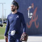 
              Atlanta Braves shortstop Dansby Swanson walks to the batting cages for spring training baseball practice at CoolToday Park on Monday, March 14, 2022, in North Port, Fla. (AP Photo/Steve Helber)
            