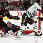 
              Dallas Stars' Jason Robertson, right, has his shot blocked by Carolina Hurricanes goaltender Frederik Andersen (31) with Sebastian Aho (20) nearby during the first period of an NHL hockey game in Raleigh, N.C., Thursday, March 24, 2022. (AP Photo/Karl B DeBlaker)
            