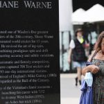 
              A woman pauses as she pays her respects at the statue of cricket legend Shane Warne outside the Melbourne Cricket Ground in Melbourne, Australia, Saturday, March 5, 2022. Warne, widely regarded as one of the greatest players, most astute tacticians and ultimate competitors in the long history of cricket, has died of a suspected heart attack Friday, March 4, 2022, in Koh Samui, Thailand. He was 52. (AP Photo/Asanka Brendon Ratnayake)
            