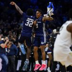 
              Saint Peter's Jaylen Murray, left, and Latrell Reid celebrate after Saint Peter's won a college basketball game against Purdue in the Sweet 16 round of the NCAA tournament, Friday, March 25, 2022, in Philadelphia. (AP Photo/Matt Rourke)
            