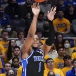 
              Duke's Trevor Keels (1) shoots against Pittsburgh during the first half of an NCAA college basketball game Tuesday, March 1, 2022, in Pittsburgh. (AP Photo/Keith Srakocic)
            