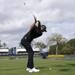 
              Dustin Johnson hits from the 17th tee during a practice round at The Players Championship golf tournament, Wednesday, March 9, 2022, in Ponte Vedra Beach, Fla. (AP Photo/Lynne Sladky)
            