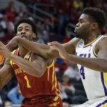 
              Iowa State's Izaiah Brockington tries to shoot with LSU's Darius Days defending during the first half of a first round NCAA college basketball tournament game Friday, March 18, 2022, in Milwaukee. (AP Photo/Jeffrey Phelps)
            
