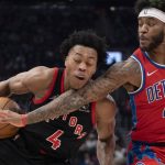 
              Toronto Raptors forward Scottie Barnes (4) drives to the basket as Detroit Pistons forward Saddiq Bey (41) defends during the first half of an NBA basketball game in Toronto on Thursday March 3, 2022. (Frank Gunn/The Canadian Press via AP)
            