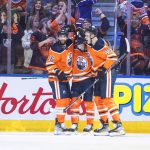 
              Edmonton Oilers' Derick Brassard (16), Ryan Nugent-Hopkins (93) and Jesse Puljujarvi (13) celebrate a goal against the San Jose Sharks during third-period NHL hockey game action in Edmonton, Alberta, Thursday, March 24, 2022. (Jason Franson/The Canadian Press via AP)
            