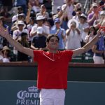 
              Taylor Fritz reacts after winning his men's singles semifinals match over Andrey Rublev, of Russia, at the BNP Paribas Open tennis tournament Saturday, March 19, 2022, in Indian Wells, Calif. Fritz won 7-5, 6-4. (AP Photo/Mark J. Terrill)
            