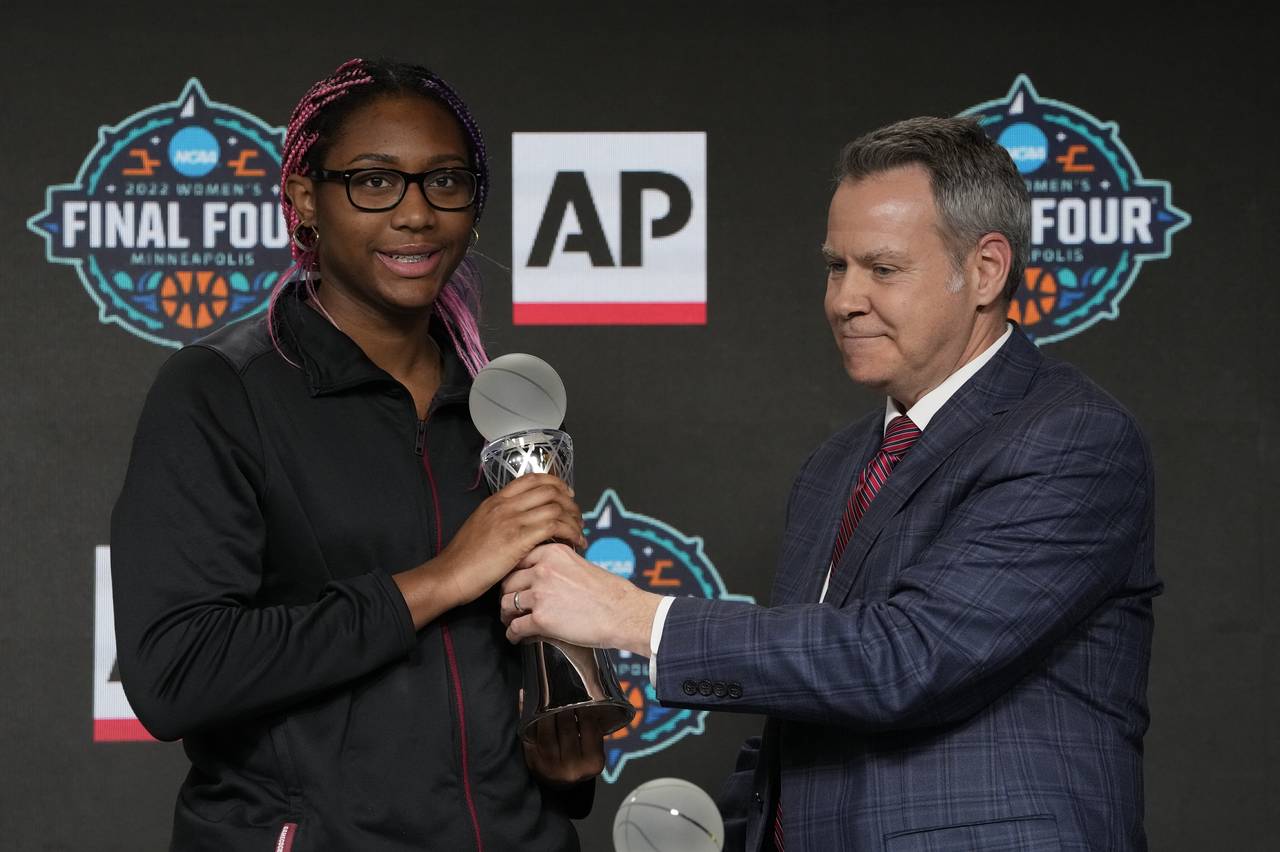 Associated Press' Doug Glass gives South Carolina's Aliyah Boston the AP Player of the Year award a...