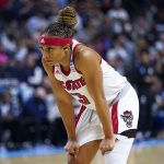 
              NC State guard Kai Crutchfield (3) pauses during a break in play against Connecticut during double overtime of the East Regional final college basketball game of the NCAA women's tournament, Monday, March 28, 2022, in Bridgeport, Conn. (AP Photo/Frank Franklin II)
            