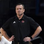 
              Louisville head coach Jeff Walz watches against Michigan during the first half of a college basketball game in the Elite 8 round of the NCAA women's tournament Monday, March 28, 2022, in Wichita, Kan. (AP Photo/Jeff Roberson)
            