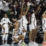 
              South Carolina forward Aliyah Boston (4) celebrates with teammates during the second half of a college basketball game against Creighton in the Elite 8 round of the NCAA tournament in Greensboro, N.C., Sunday, March 27, 2022. (AP Photo/Gerry Broome)
            
