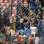 
              Fans clash during a Mexican soccer league match between the host Queretaro and Atlas from Guadalajara, at the Corregidora stadium, in Queretaro, Mexico, Saturday, March 5, 2022. Multiple people were injured during the brawl, including two critically. (AP Photo/Sergio Gonzalez)
            