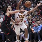 
              Toronto Raptors guard Fred VanVleet (23) and Cleveland Cavaliers guard Tim Frazier (10) vie for the ball during the second half of an NBA basketball game Thursday, March 24, 2022, in Toronto. (Nathan Denette/The Canadian Press via AP)
            