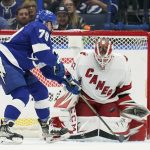 
              Tampa Bay Lightning center Ross Colton (79) gets a shot off on Carolina Hurricanes goaltender Antti Raanta (32) during the first period of an NHL hockey game Tuesday, March 29, 2022, in Tampa, Fla. (AP Photo/Chris O'Meara)
            
