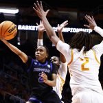 
              Buffalo guard Dyaisha Fair (2) shoots past Tennessee forward Alexus Dye (2) during the second half of a college basketball game in the first round of the NCAA Tournament, Saturday, March 19, 2022, in Knoxville, Tenn. (AP Photo/Wade Payne)
            