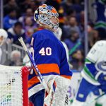 
              New York Islanders goaltender Semyon Varlamov (40) reacts as the Vancouver Canucks celebrate a goal by Vasily Podkolzin during the third period of an NHL hockey game Thursday, March 3, 2022, in Elmont, N.Y. (AP Photo/Frank Franklin II)
            