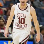 
              South Carolina guard Erik Stevenson reacts after sinking a 3-point basket during the first half of an NCAA men's college basketball game at the Southeastern Conference tournament in Tampa, Fla., Thursday, March 10, 2022. (AP Photo/Chris O'Meara)
            