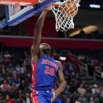
              Detroit Pistons center Isaiah Stewart (28) dunks against the Portland Trail Blazers in the first half of an NBA basketball game in Detroit, Monday, March 21, 2022. (AP Photo/Paul Sancya)
            
