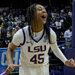 
              LSU guard Alexis Morris (45) celebrates her team's victory over Jackson State in a women's college basketball game in the first round of the NCAA tournament, Saturday, March 19, 2022, in Baton Rouge, La. (AP Photo/Matthew Hinton)
            