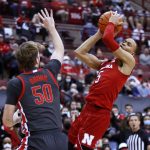
              Nebraska guard Bryce McGowen, right, is defended by Ohio State center Joey Brunk during the first half of an NCAA college basketball game in Columbus, Ohio, Tuesday, March 1, 2022. (AP Photo/Paul Vernon)
            