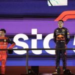 
              Second placed Ferrari driver Charles Leclerc of Monaco, left, and first placed Red Bull driver Max Verstappen of the Netherlands stand at the podium after the Formula One Grand Prix it in Jiddah, Saudi Arabia, Sunday, March 27, 2022. (AP Photo/Hassan Ammar)
            