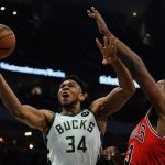 
              Milwaukee Bucks' Giannis Antetokounmpo is fouled by Chicago Bulls' Tristan Thompson during the first half of an NBA basketball game Tuesday, March 22, 2022, in Milwaukee . (AP Photo/Morry Gash)
            