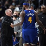 
              Denver Nuggets coach Michael Malone, left, congratulates center DeMarcus Cousins during the second half of an NBA basketball game against the Houston Rockets on Friday, March 4, 2022, in Denver. The Nuggets won 116-101. (AP Photo/David Zalubowski)
            