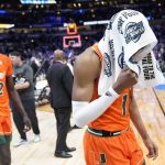
              Miami's Anthony Walker walks off the court after a college basketball game in the Elite 8 round of the NCAA tournament Sunday, March 27, 2022, in Chicago. Kansas won 76-50 to advance to the Final Four. (AP Photo/Charles Rex Arbogast)
            