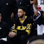 
              Brooklyn Nets' Ben Simmons watches during the first half of an NBA basketball game against the Philadelphia 76ers, Thursday, March 10, 2022, in Philadelphia. (AP Photo/Matt Slocum)
            