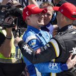 
              From left, Josef Newgarden and Scott McLaughlin embrace following the NTT IndyCar Series XPEL 375 at Texas Motor Speedway in Fort Worth, Texas, Sunday, March 20, 2022. Newgarden won the race and McLaughlin finished second. (AP Photo/Larry Papke)
            