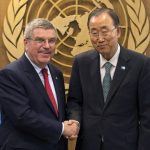 
              FILE - International Olympic Committee President Thomas Bach, left, shakes hands with United Nations Secretary-General Ban Ki-moon during a meeting at the United Nations headquarters Sunday, Sept. 27, 2015. The International Olympic Committee has always been political, from the sheikhs and royals in its membership to a seat at the United Nations to pushing for peace talks between the Koreas. But Russia’s invasion of Ukraine three weeks ago exposed its irreconcilable claims of “political neutrality.” (AP Photo/Kevin Hagen, File)
            