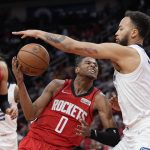 
              Houston Rockets' Jalen Green (0) drives to the basket as Memphis Grizzlies' Kyle Anderson defends during the first half of an NBA basketball game Sunday, March 6, 2022, in Houston. (AP Photo/David J. Phillip)
            