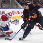 
              Montreal Canadiens' goalie Sam Montembeault (35) makes the save against Edmonton Oilers' Zach Hyman (18) during second-period NHL hockey game action in Edmonton, Alberta, Saturday, March 5, 2022. (Jason Franson/The Canadian Press via AP)
            