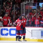 
              Washington Capitals left wing Alex Ovechkin, right, celebrates his second period goal against the Carolina Hurricanes with teammate T.J. Oshie, Thursday, March 3, 2022, in Washington. (AP Photo/Evan Vucci)
            