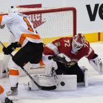 
              Florida Panthers goaltender Sergei Bobrovsky (72) stops a shot by Philadelphia Flyers right wing Travis Konecny (11) during the second period of an NHL hockey game Thursday, March 10, 2022, in Sunrise, Fla. (AP Photo/Marta Lavandier)
            