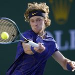 
              Andrey Rublev, of Russia, returns to Hubert Hurkacz, of Poland, at the BNP Paribas Open tennis tournament Wednesday, March 16, 2022, in Indian Wells, Calif. (AP Photo/Marcio Jose Sanchez)
            