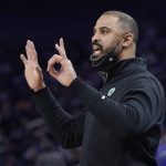 
              Boston Celtics head coach Ime Udoka gestures toward players during the first half of his team's NBA basketball game against the Golden State Warriors in San Francisco, Wednesday, March 16, 2022. (AP Photo/Jeff Chiu)
            